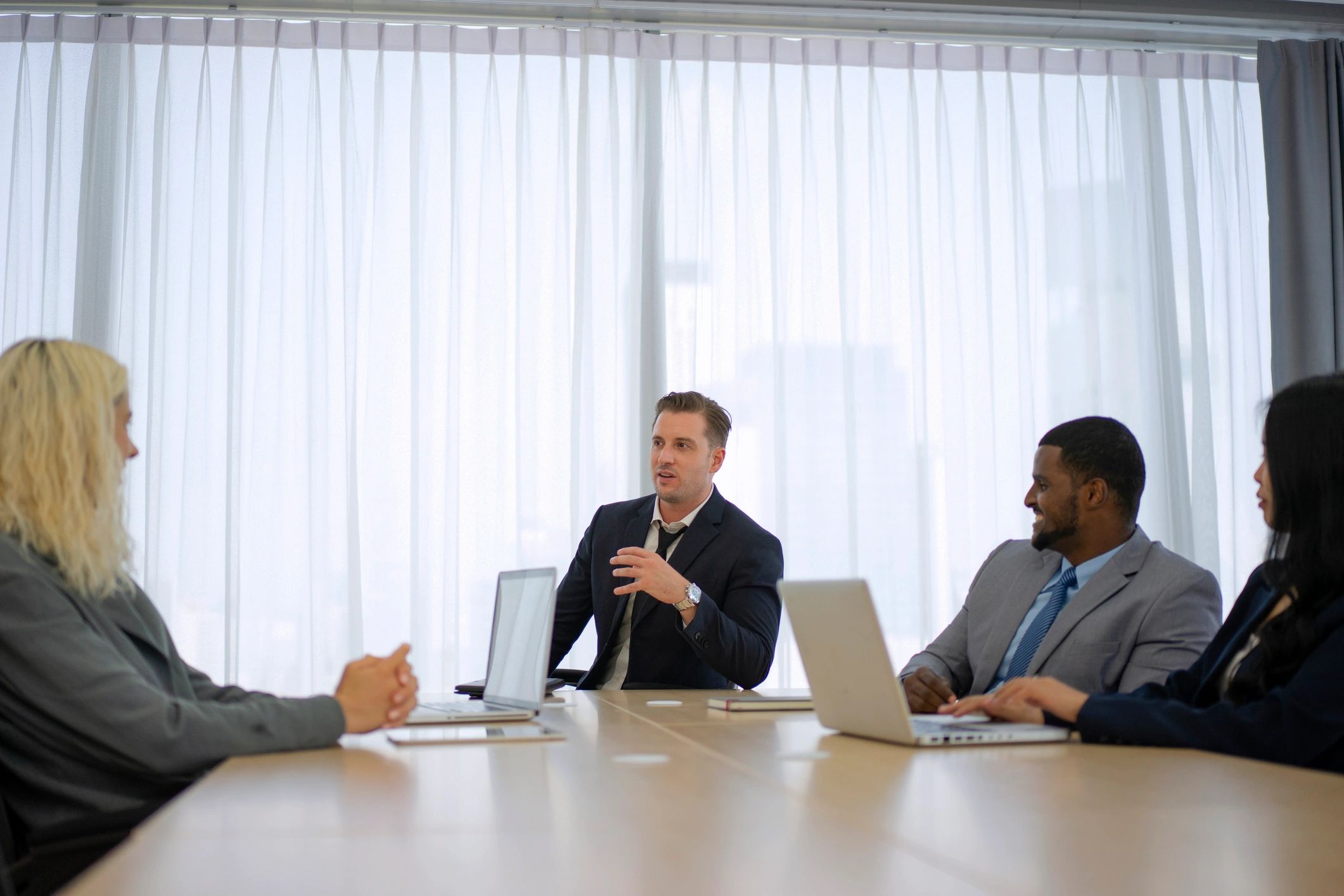 Professional business meeting focused on logistics and distribution strategy